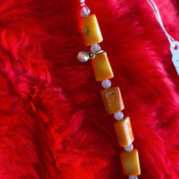 Bracelet with orange coral shell. - Picture 3 of 3